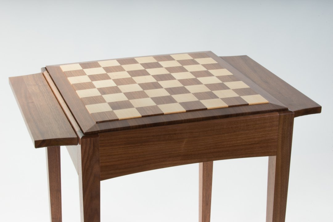 Personalize the chess table with a raised panel wooden board