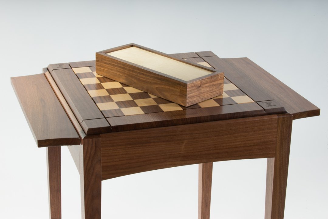 Chess table with matching hardwood box in walnut and maple.